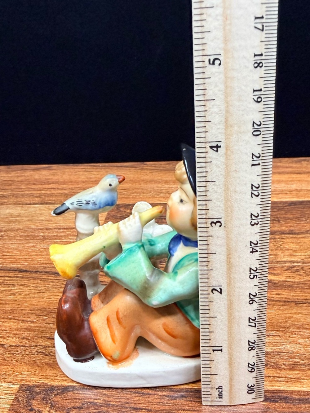 Figurine of Boy Playing Horn - Picture 15 of 15